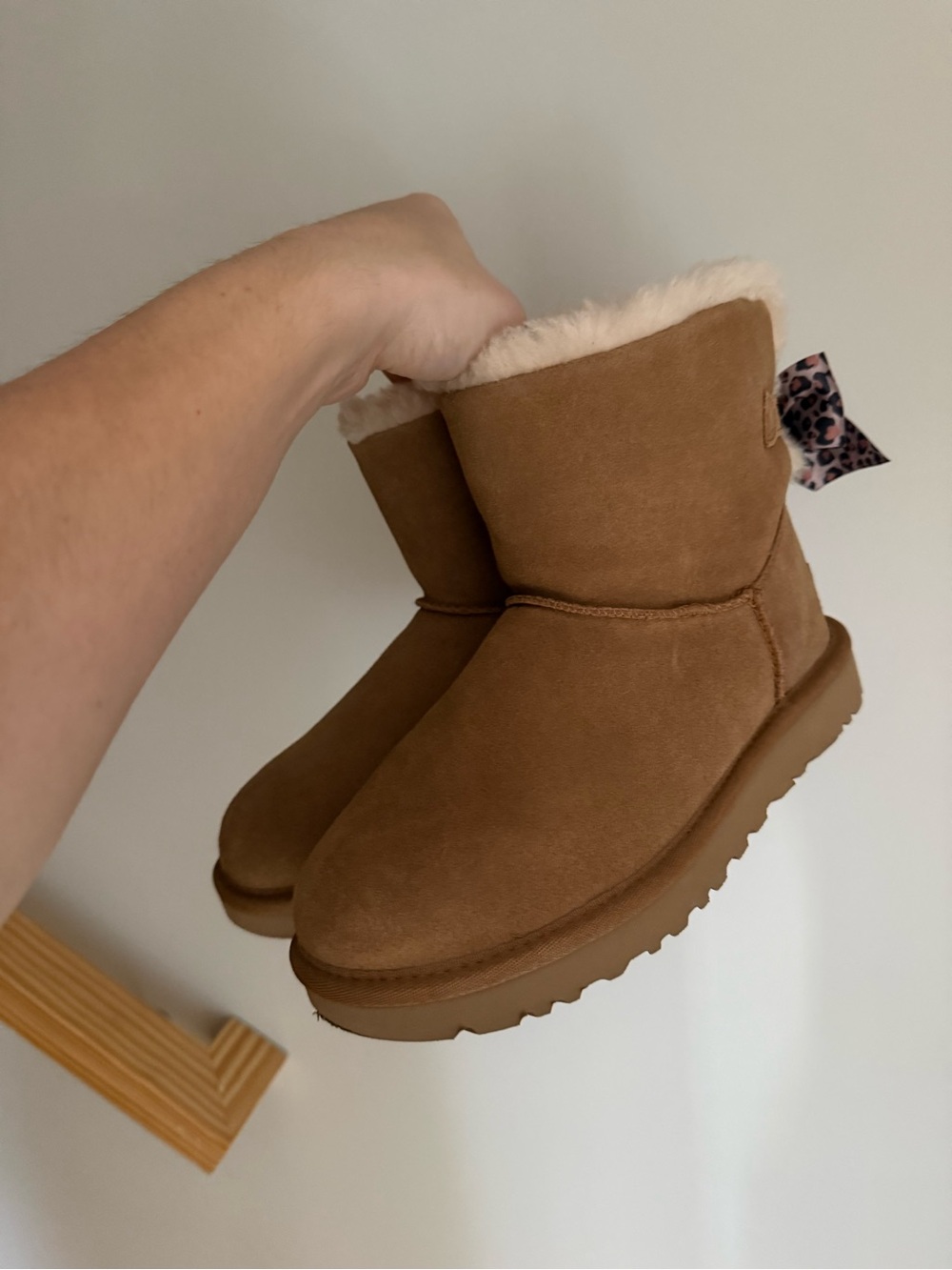 Pink leopard chestnut Bailey bow short uggs.